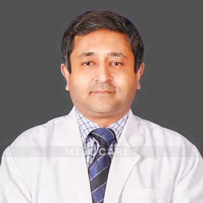 доктор Тарун Сури